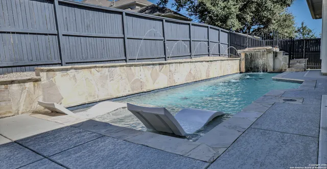 a view of a livingroom with furniture