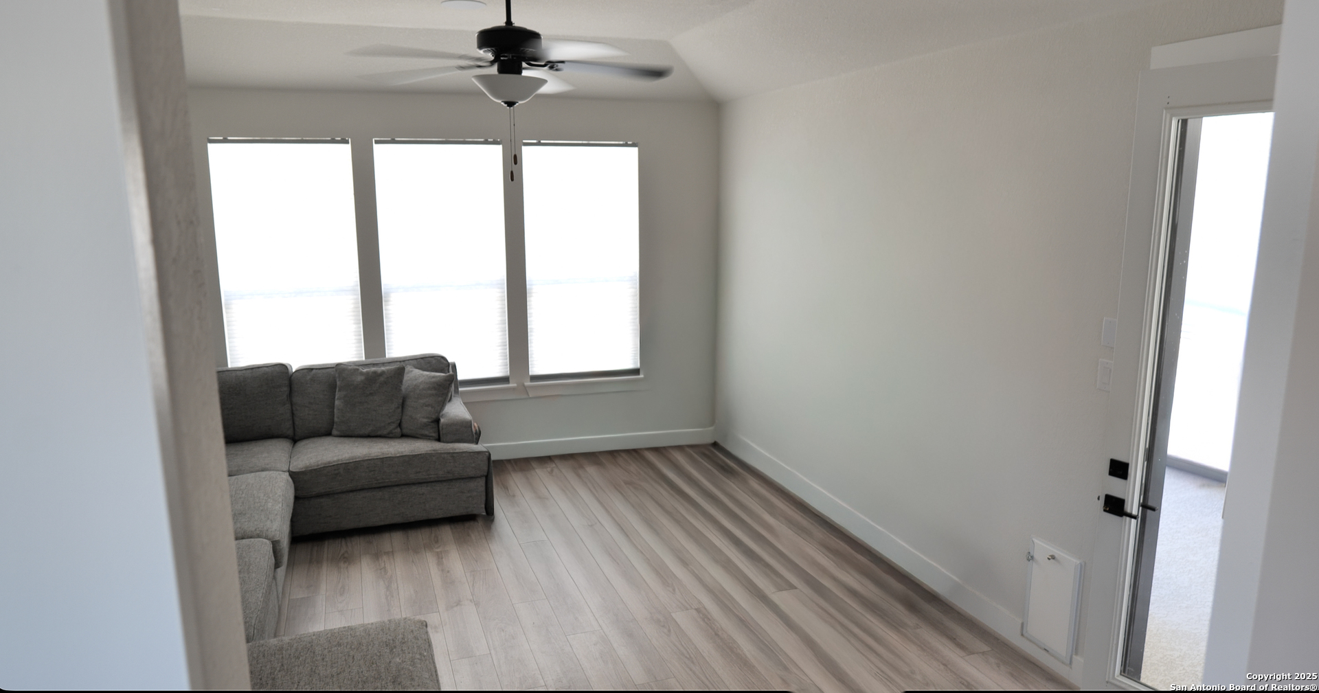 8519 Nichols Tree Boerne, TX 78015 - Photo 16 of 27 a living room with furniture and a window