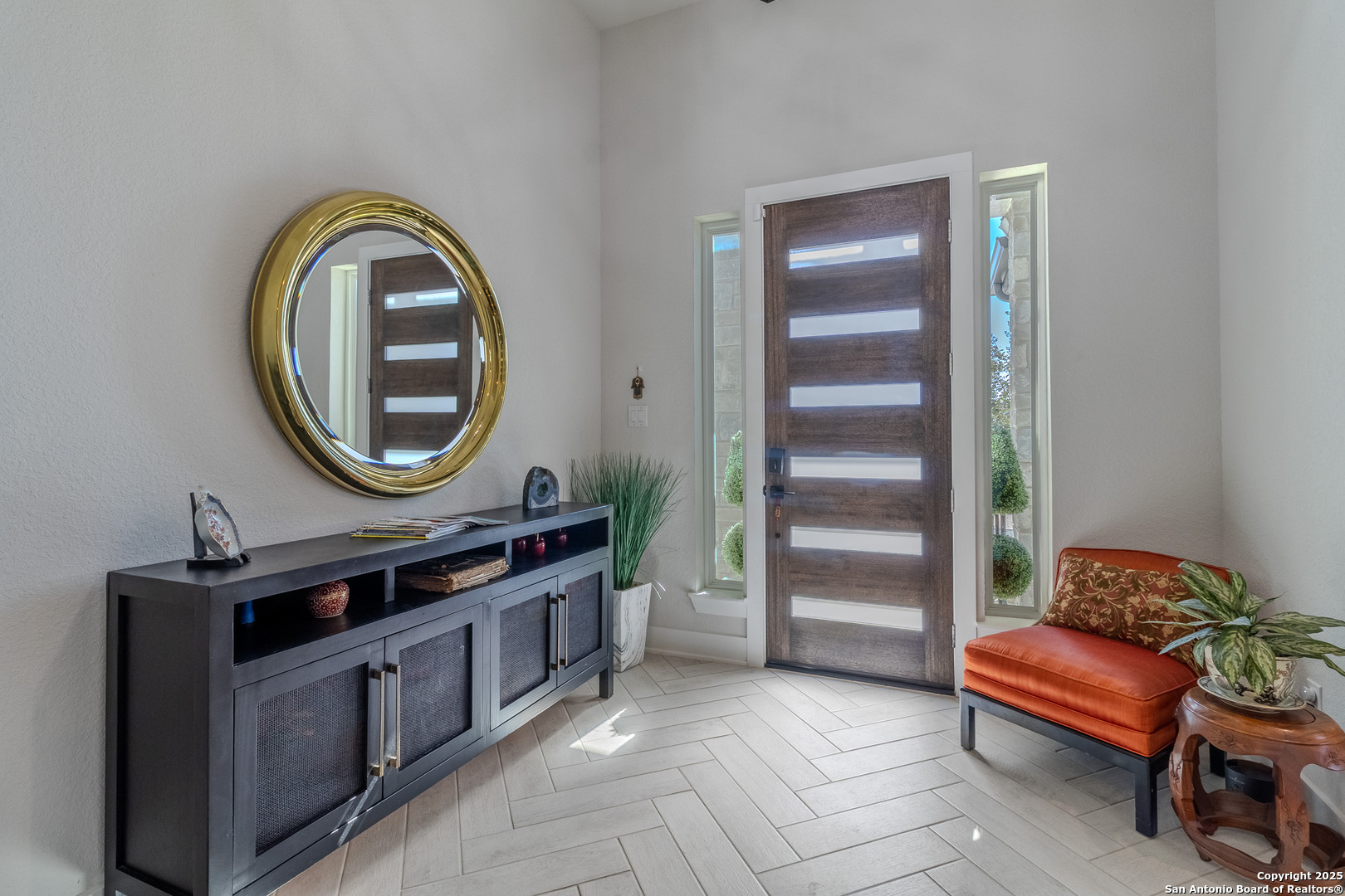 8519 Nichols Tree Boerne, TX 78015 - Photo 3 of 27 a view of a livingroom with furniture and a mirror