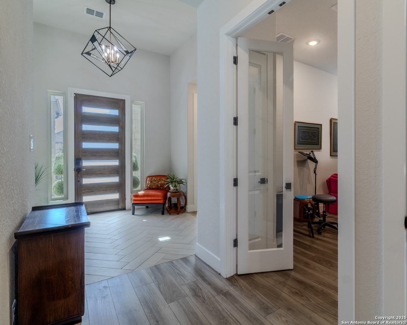 8519 Nichols Tree Boerne, TX 78015 - Photo 5 of 27 a view of a livingroom with wooden floor and furniture