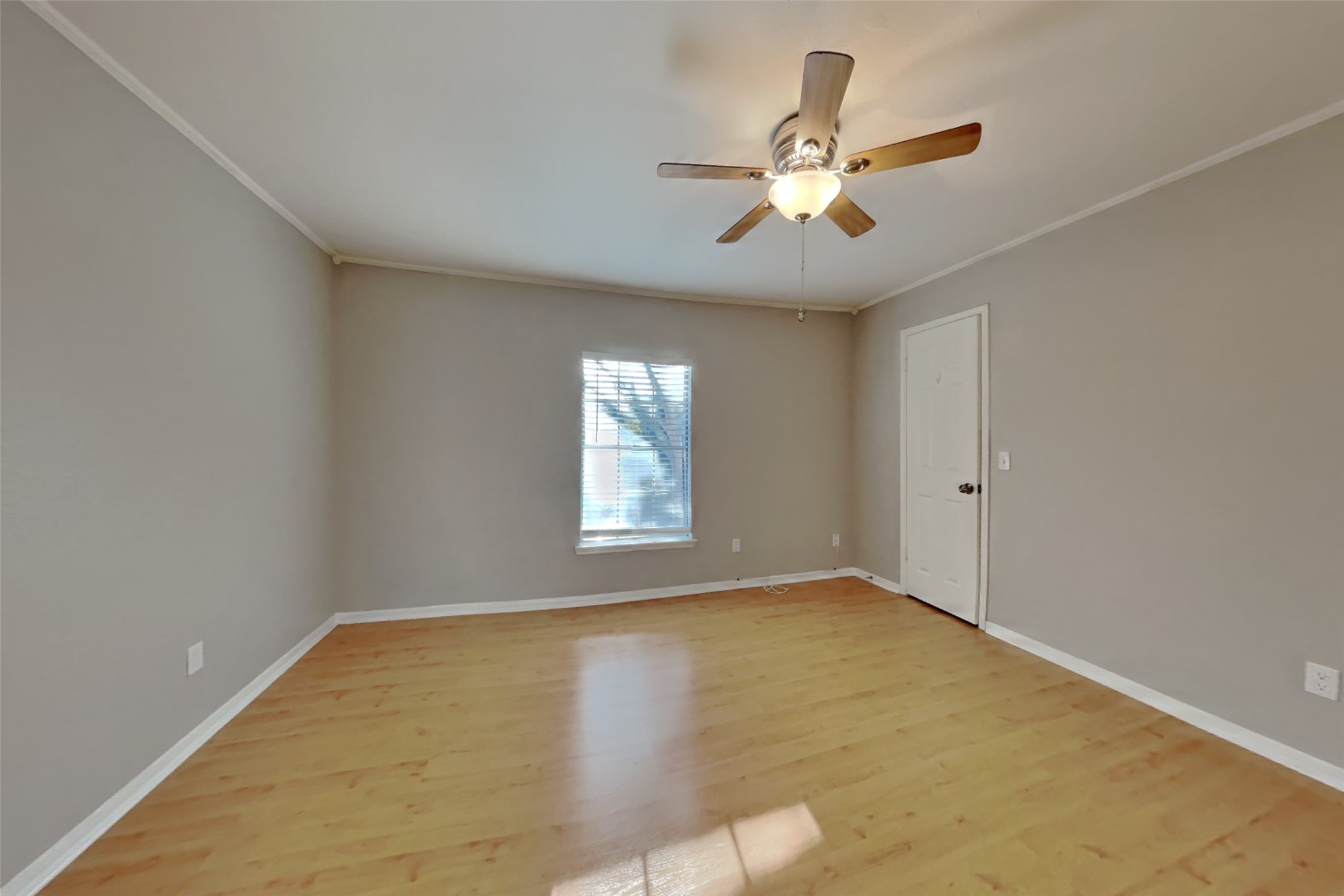 7611 Round Grove Lane Houston, TX 77095 - Photo 15 of 22 wooden floor in an empty room with a window