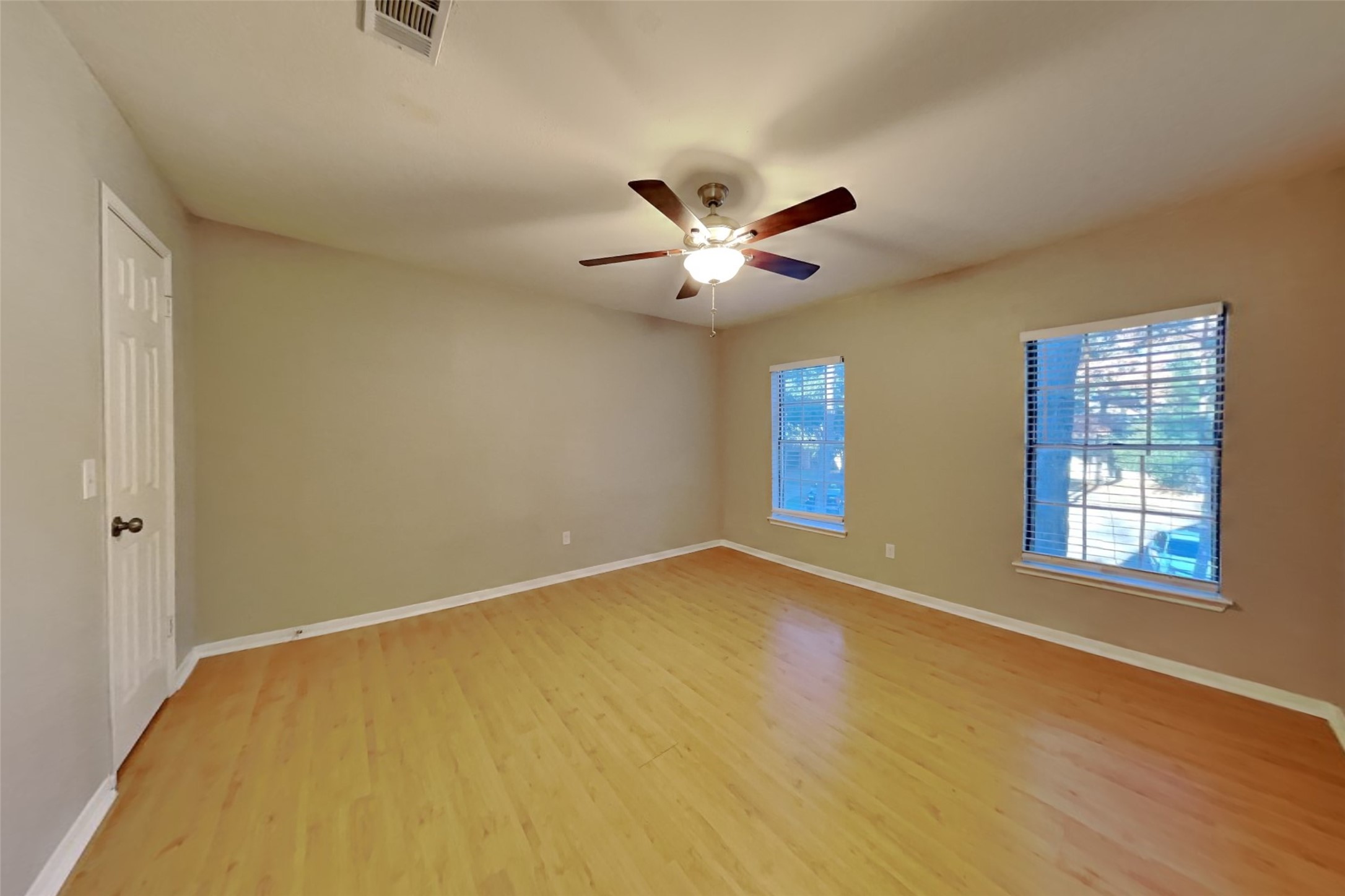 7611 Round Grove Lane Houston, TX 77095 - Photo 16 of 22 a view of an empty room with a window