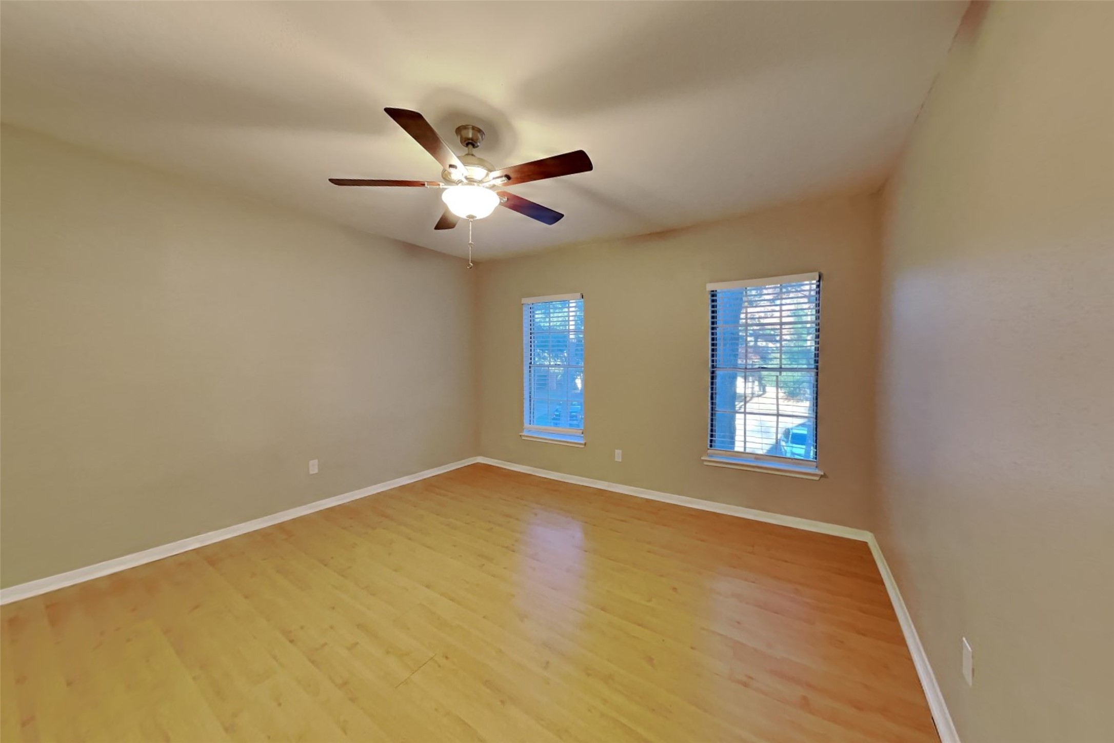 7611 Round Grove Lane Houston, TX 77095 - Photo 17 of 22 a view of an empty room with a window