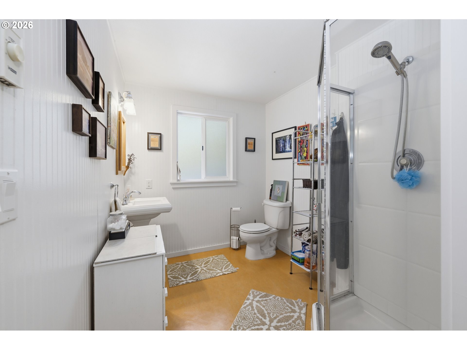 88119 Tiki Lane Springfield, OR 97478 - Photo 16 of 35 a bathroom with a sink toilet and shower