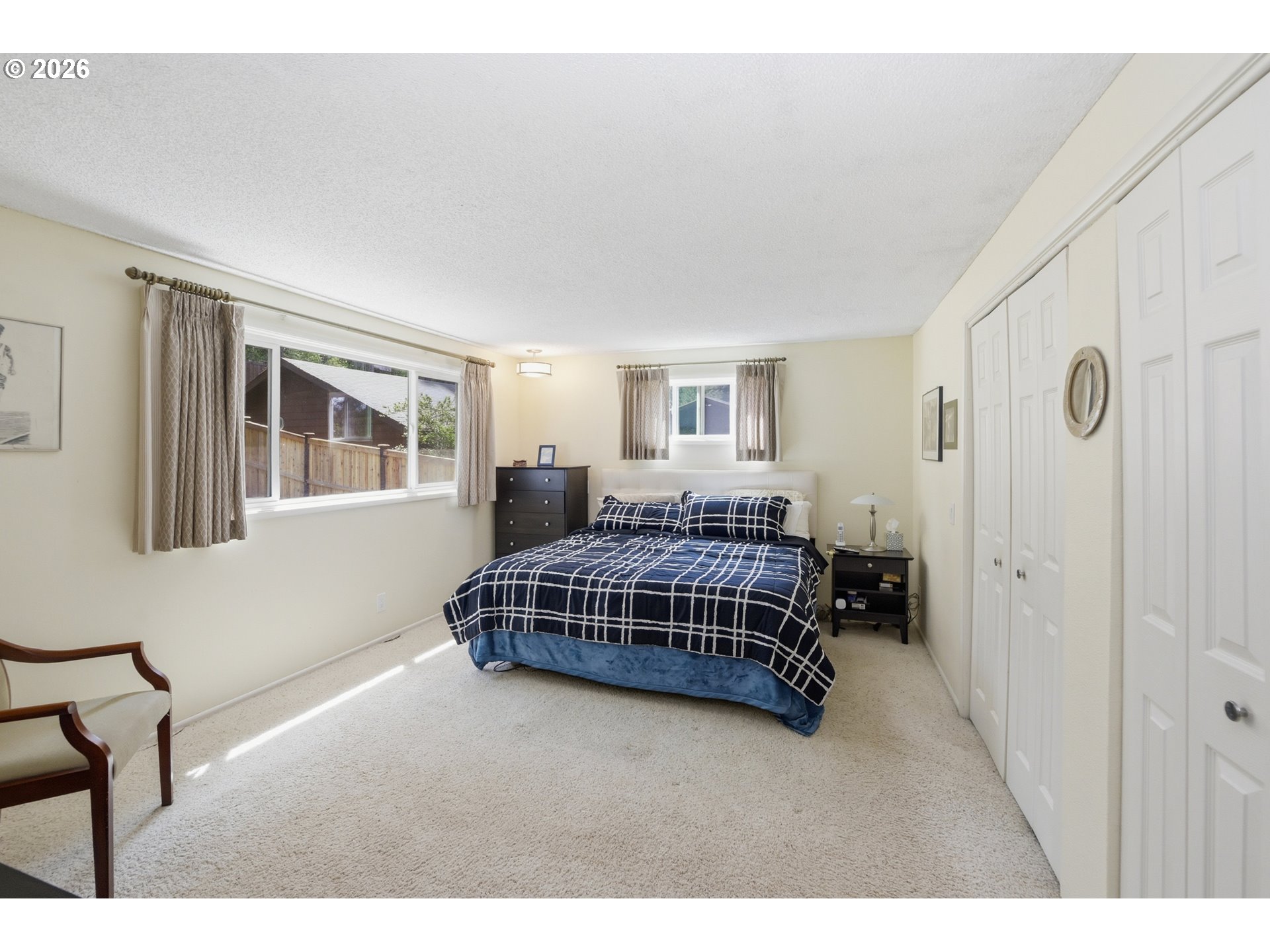 88119 Tiki Lane Springfield, OR 97478 - Photo 20 of 35 a bedroom with a bed and window