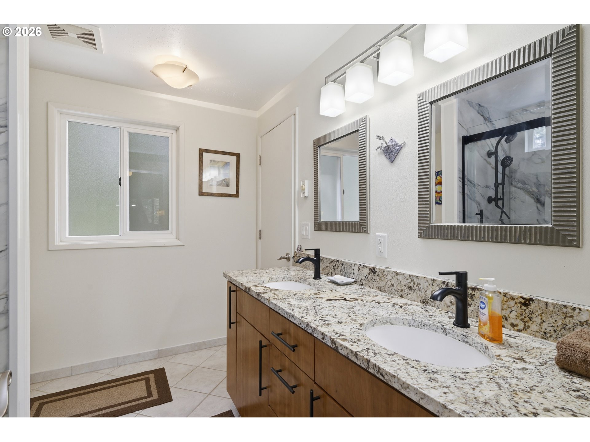 88119 Tiki Lane Springfield, OR 97478 - Photo 22 of 35 a bathroom with a granite countertop sink mirror and vanity