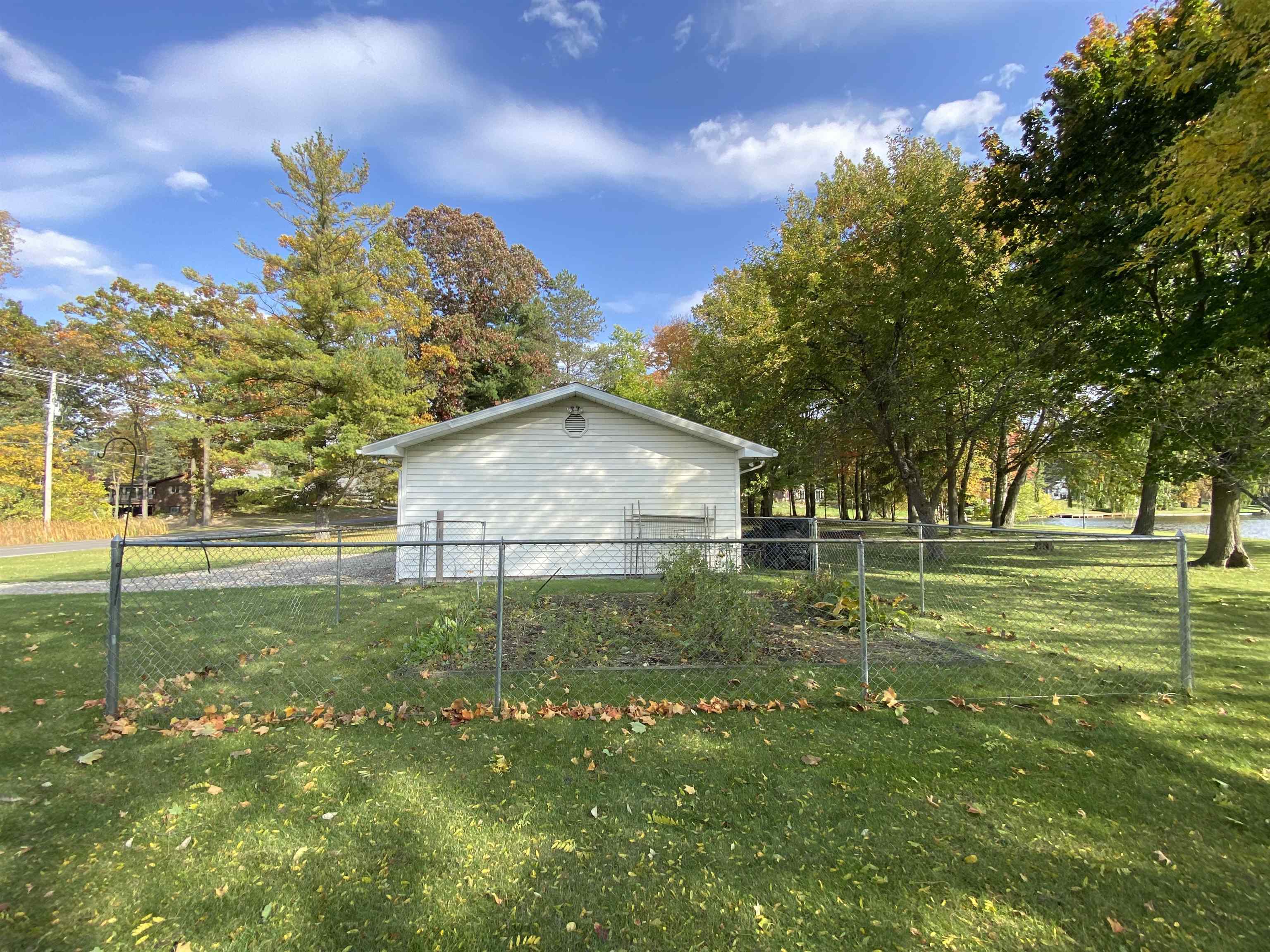 2055 West Garrison Road Owosso, MI 48867 - Photo 33 of 49 Fenced Garden area