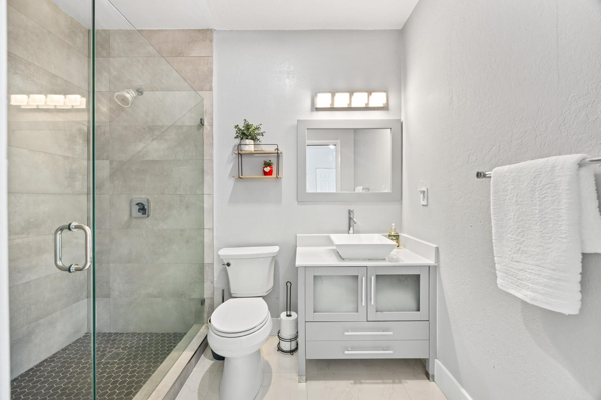 5021 Southwest 201st Terrace Southwest Ranches, FL 33332 - Photo 22 of 50 a bathroom with a sink toilet and shower
