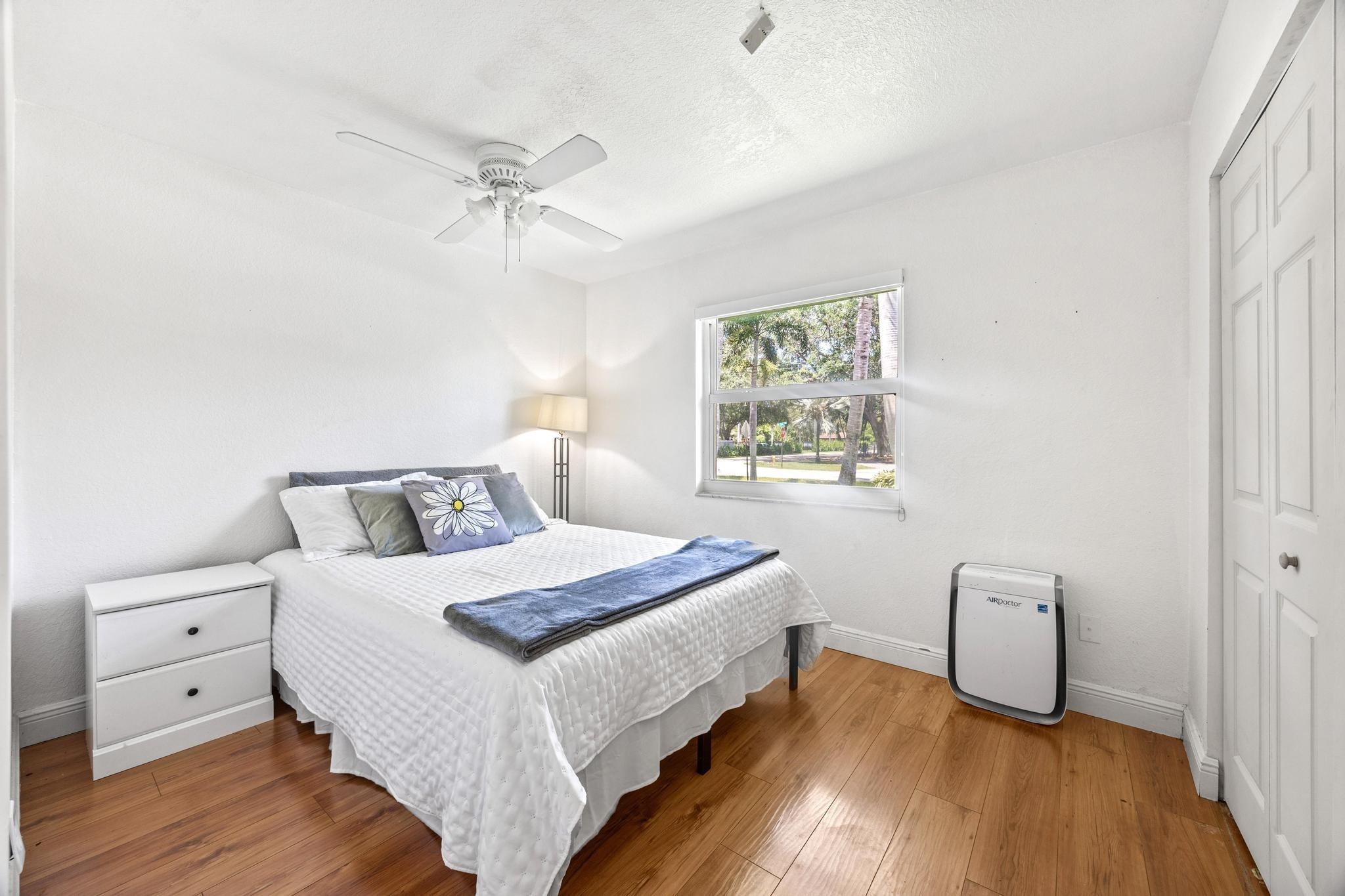 5021 Southwest 201st Terrace Southwest Ranches, FL 33332 - Photo 25 of 50 a bedroom with a bed and a window