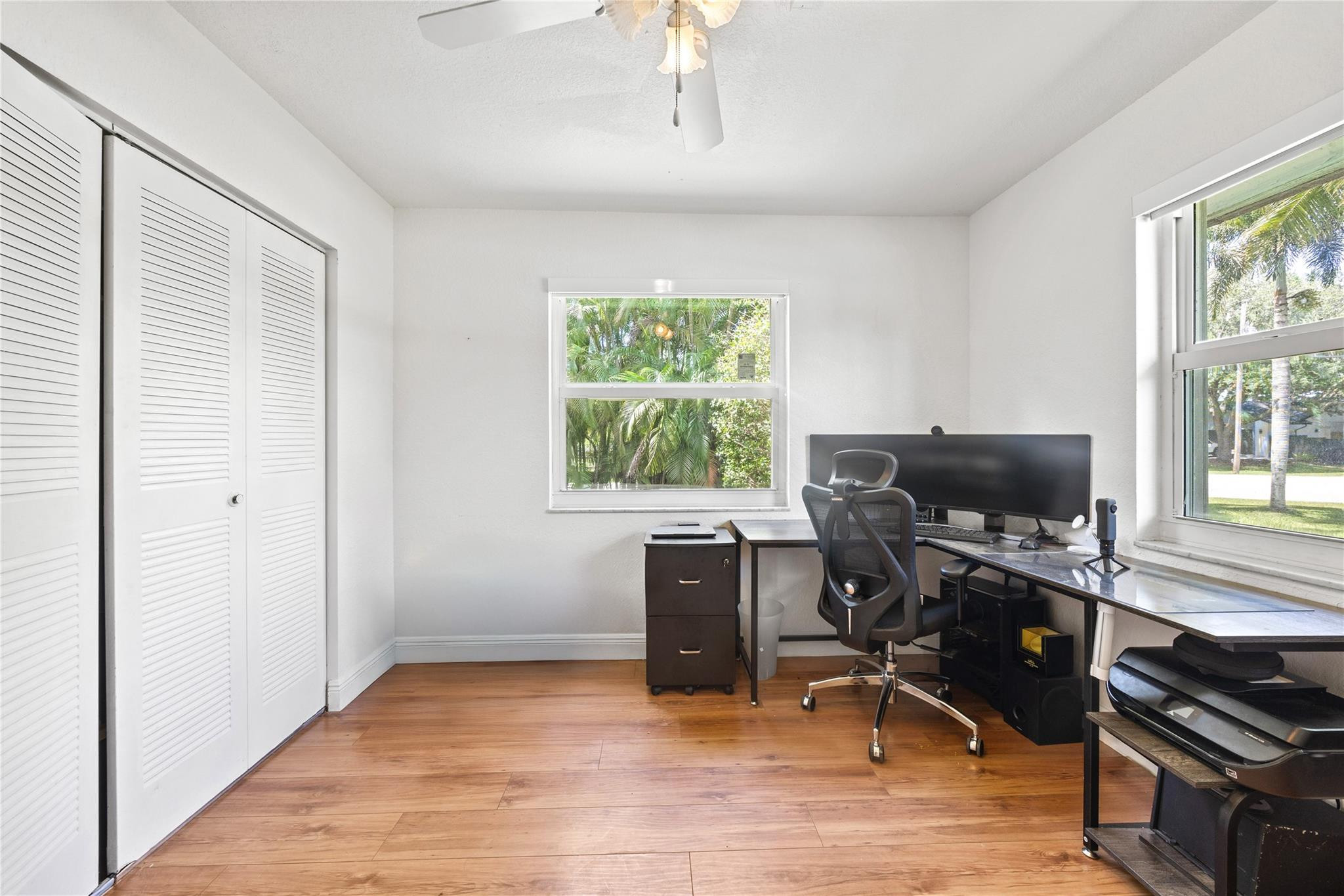 5021 Southwest 201st Terrace Southwest Ranches, FL 33332 - Photo 26 of 50 a view of a workspace with furniture and a window