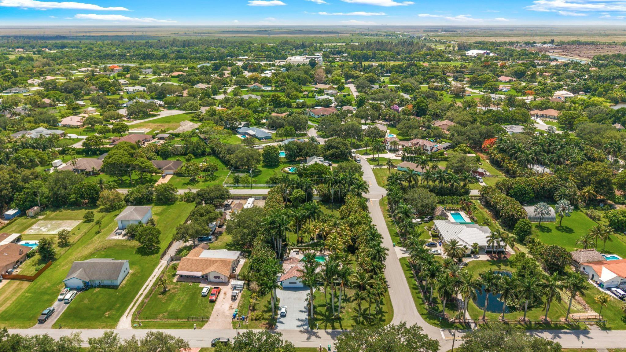 5021 Southwest 201st Terrace Southwest Ranches, FL 33332 - Photo 50 of 50 an aerial view of residential houses with outdoor space
