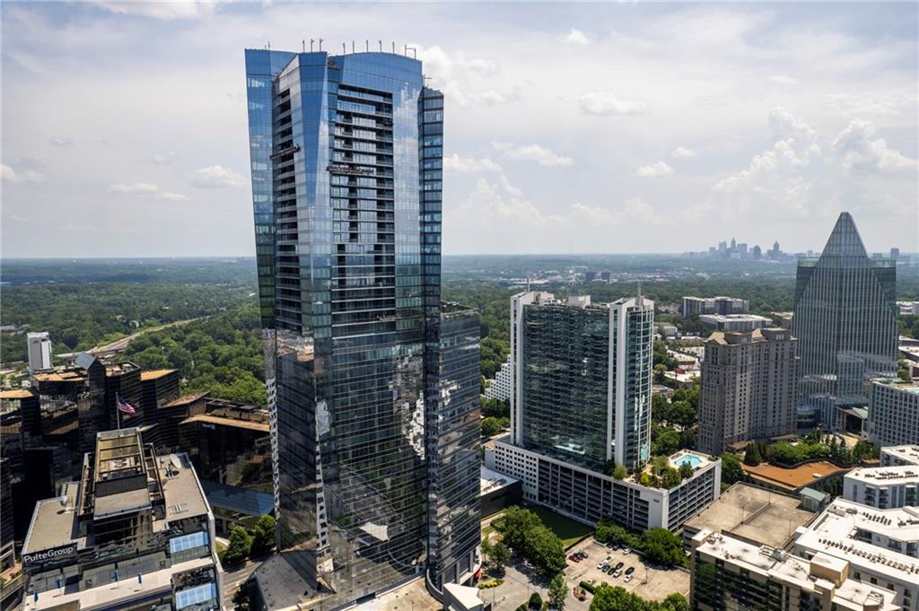 3344 Peachtree Road Northeast, Unit 3601 Atlanta, GA 30326 - Photo 1 of 1 a view of a city with tall buildings