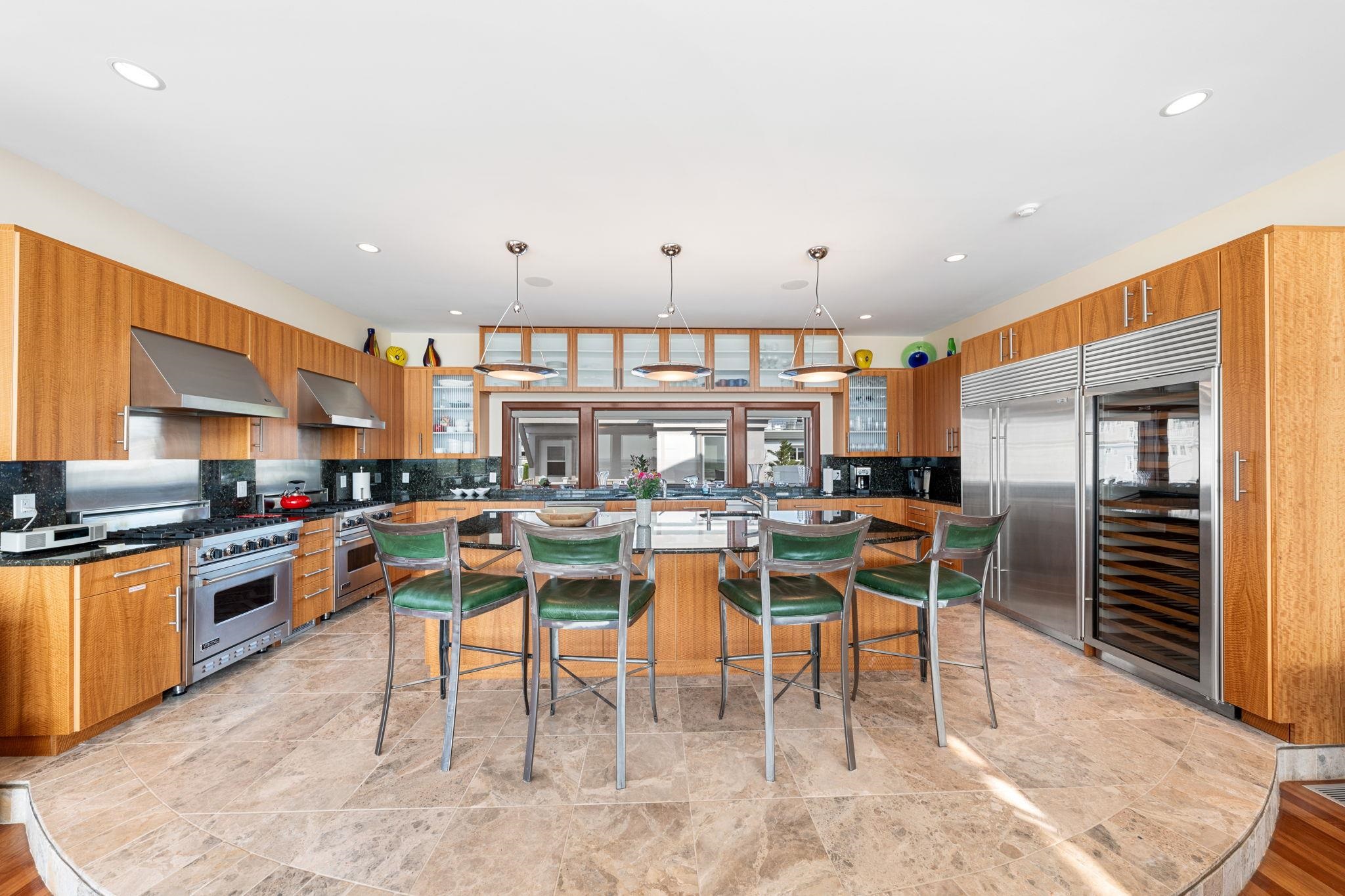 5878 Ocean Drive Avalon, NJ 08202 - Photo 21 of 50 a large kitchen with a table and chairs