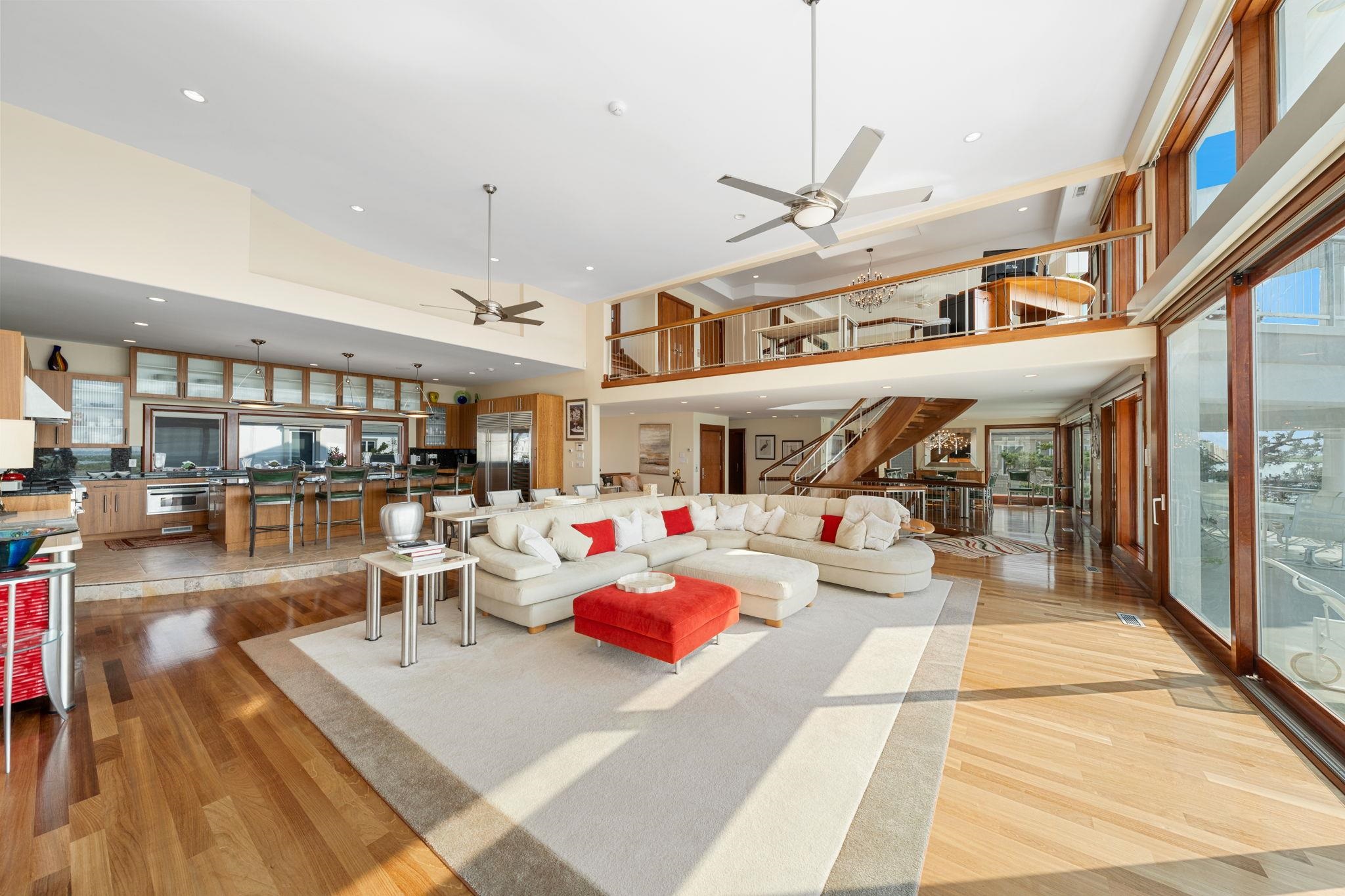 5878 Ocean Drive Avalon, NJ 08202 - Photo 25 of 50 a living room with lots of furniture and white walls