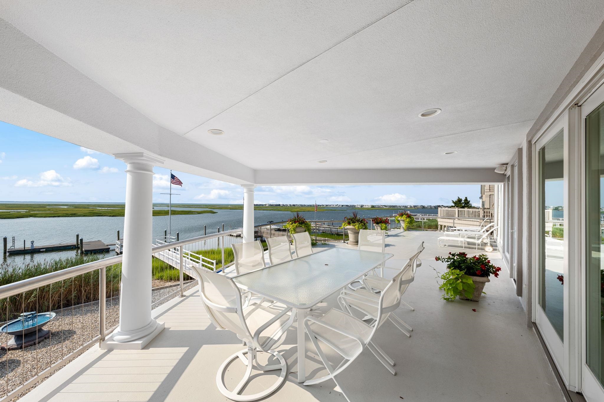 5878 Ocean Drive Avalon, NJ 08202 - Photo 29 of 50 a living room with furniture and garden view
