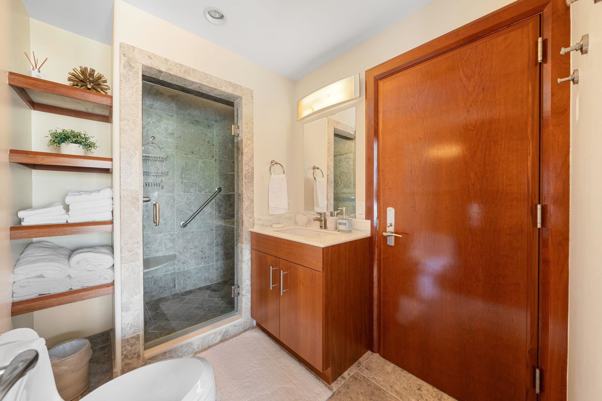 5878 Ocean Drive Avalon, NJ 08202 - Photo 32 of 50 a bathroom with a shower and a sink