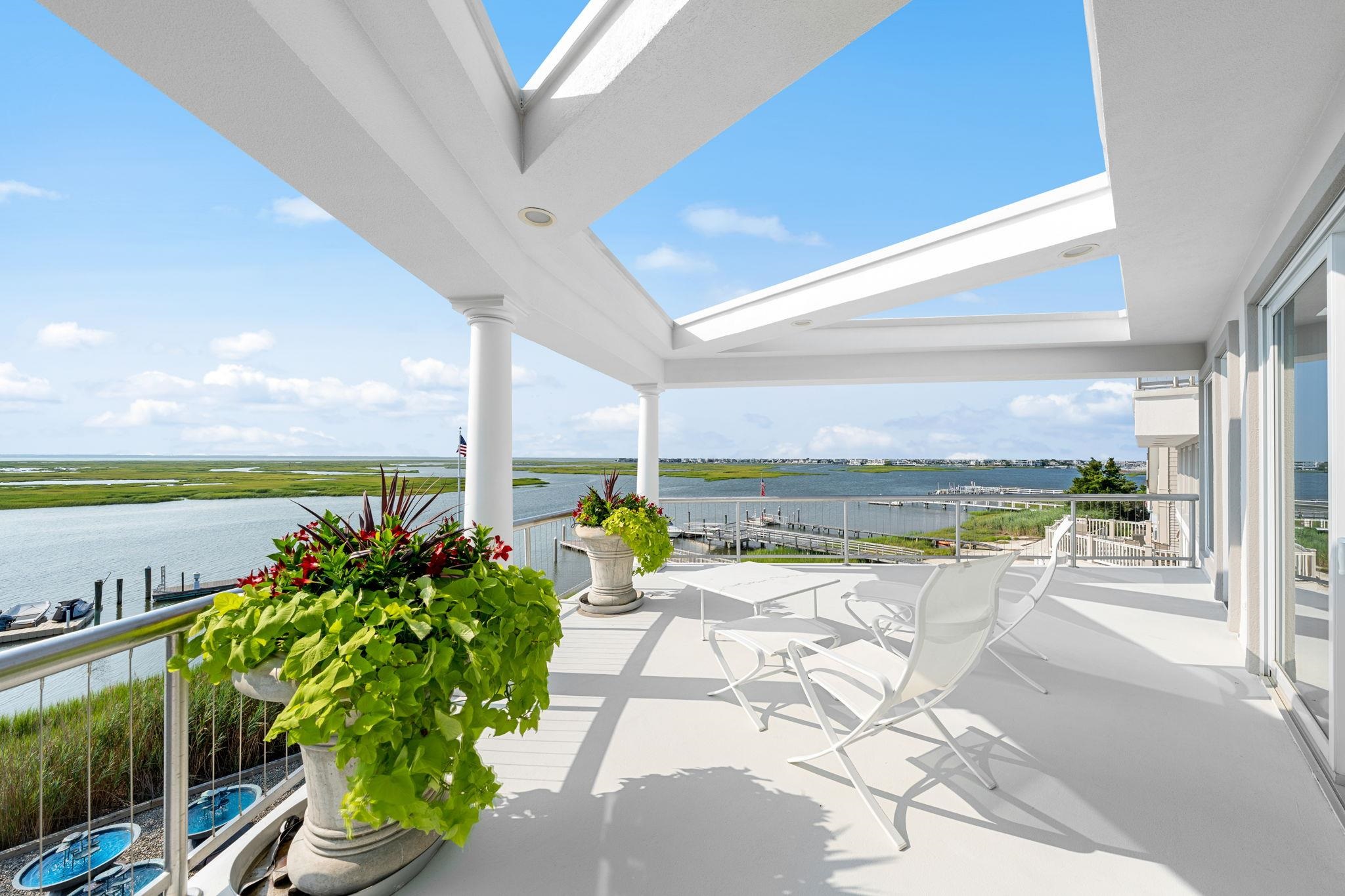 5878 Ocean Drive Avalon, NJ 08202 - Photo 36 of 50 a view of a balcony with lake view and a ocean view