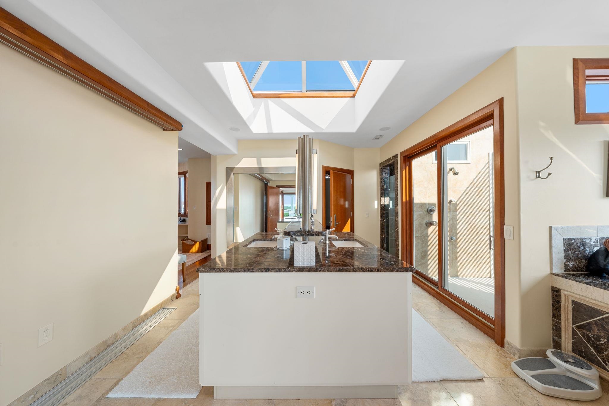 5878 Ocean Drive Avalon, NJ 08202 - Photo 39 of 50 a living room with stainless steel appliances granite countertop furniture and a large window