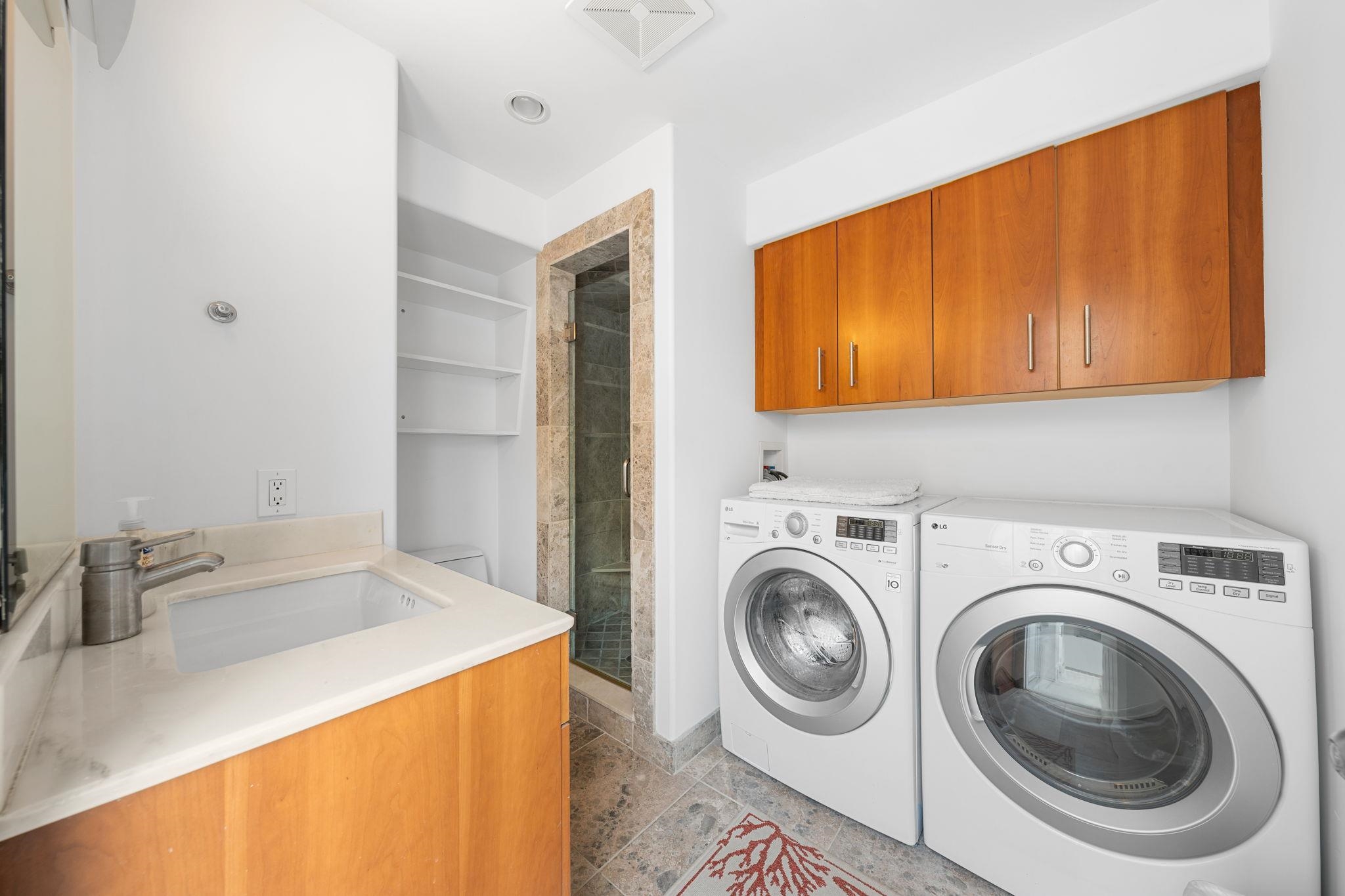 5878 Ocean Drive Avalon, NJ 08202 - Photo 44 of 50 a utility room with sink dryer and washer