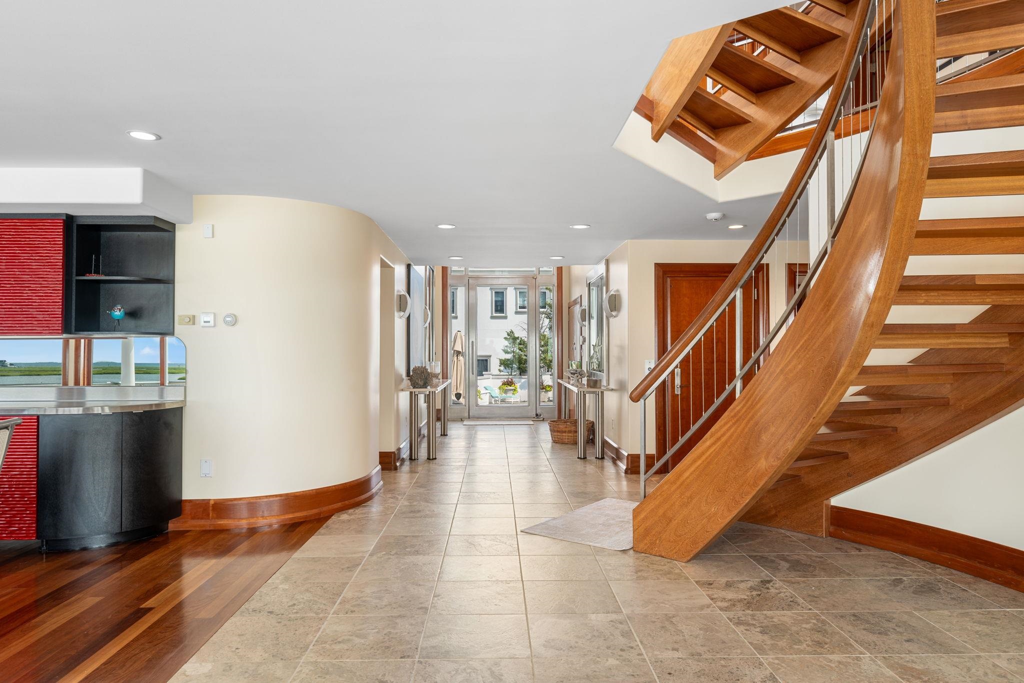 5878 Ocean Drive Avalon, NJ 08202 - Photo 7 of 50 a view of entryway and hall with dining room
