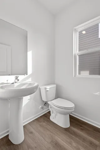 a bathroom with a sink and a toilet