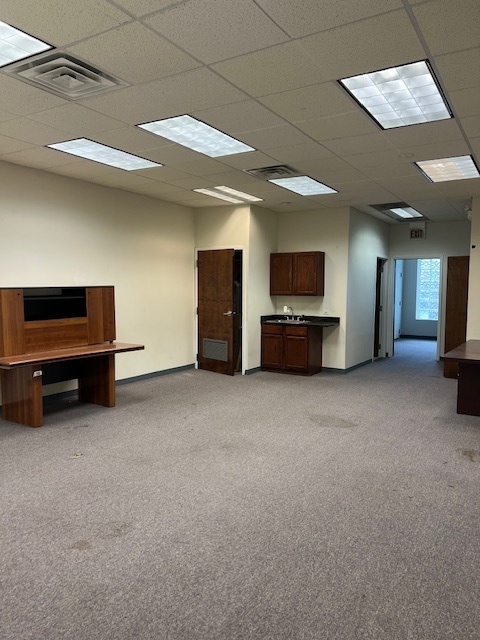 719 South State Street Chicago, IL 60605 - Photo 32 of 34 a living room with furniture and a flat screen tv