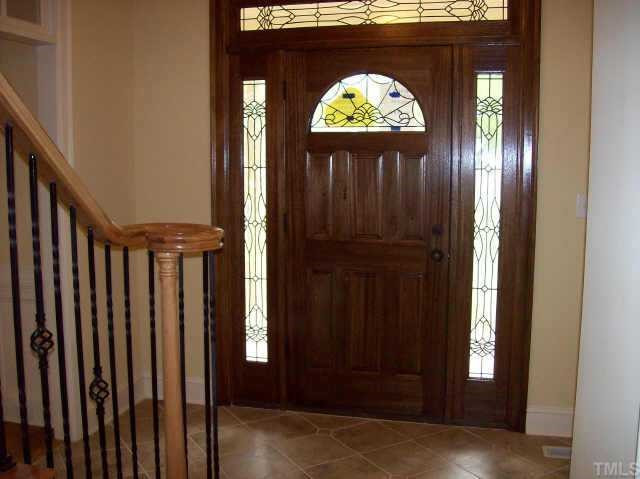 3928 Bending Birch Drive Raleigh, NC 27613 - Photo 4 of 10 tumbled marble entry foyer with deorative inlays, iron ballasters, hardwoods down (except full bath) Other