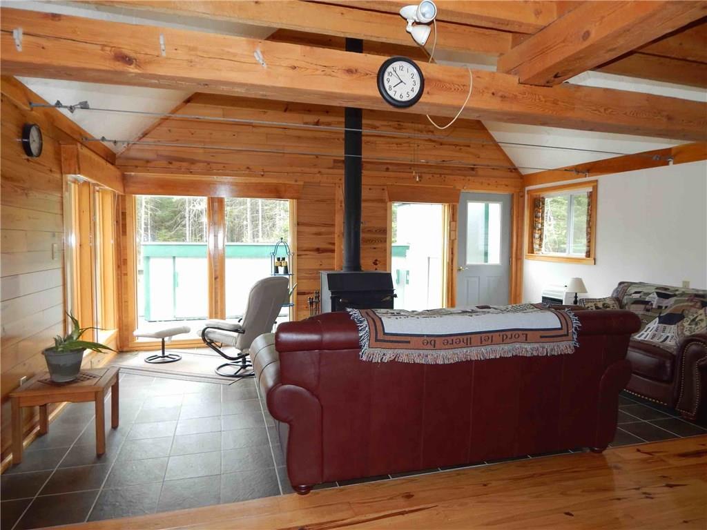 427 Cannon Hill Road Perry, ME 04667 - Photo 11 of 30 Living area with cathedral ceiling....