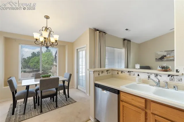 a spacious bathroom with a double vanity sink and a mirror