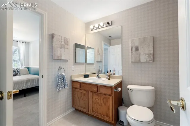 a bathroom with a shower and a glass door