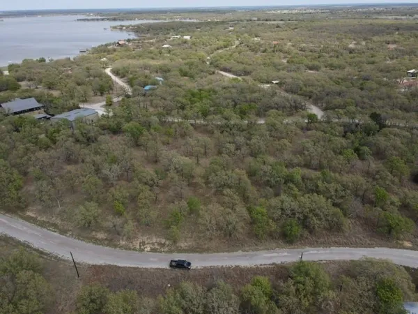 a street sign sitting on a wooden floor