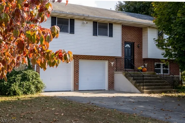 a front view of house with yard