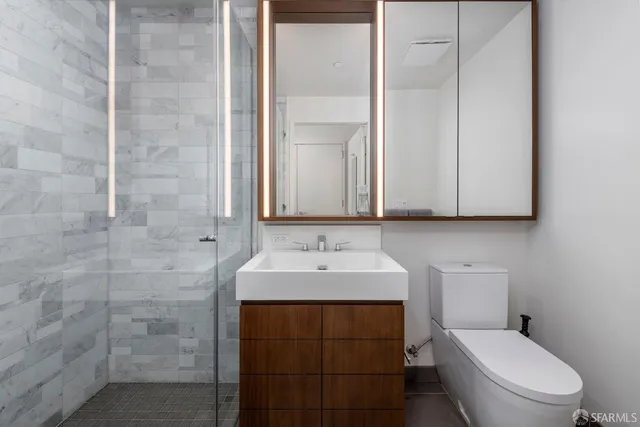 a bathroom with a sink and a toilet