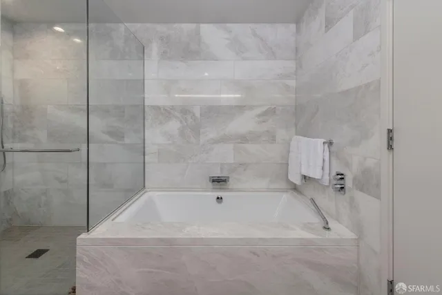 a close view of a bathtub in bathroom