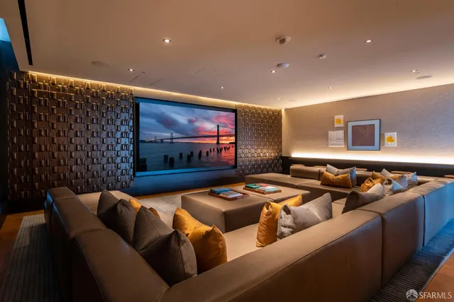 a view of a livingroom with furniture window and wooden floor
