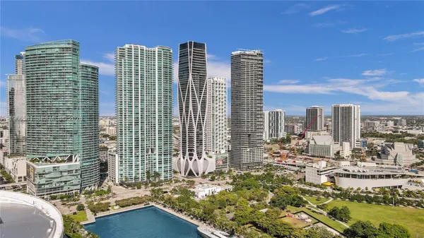a view of a city with tall buildings