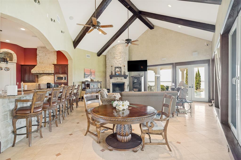 1237 Overlook Court Whitney, TX 76692 - Photo 5 of 20 a dining room with furniture a chandelier and wooden floor