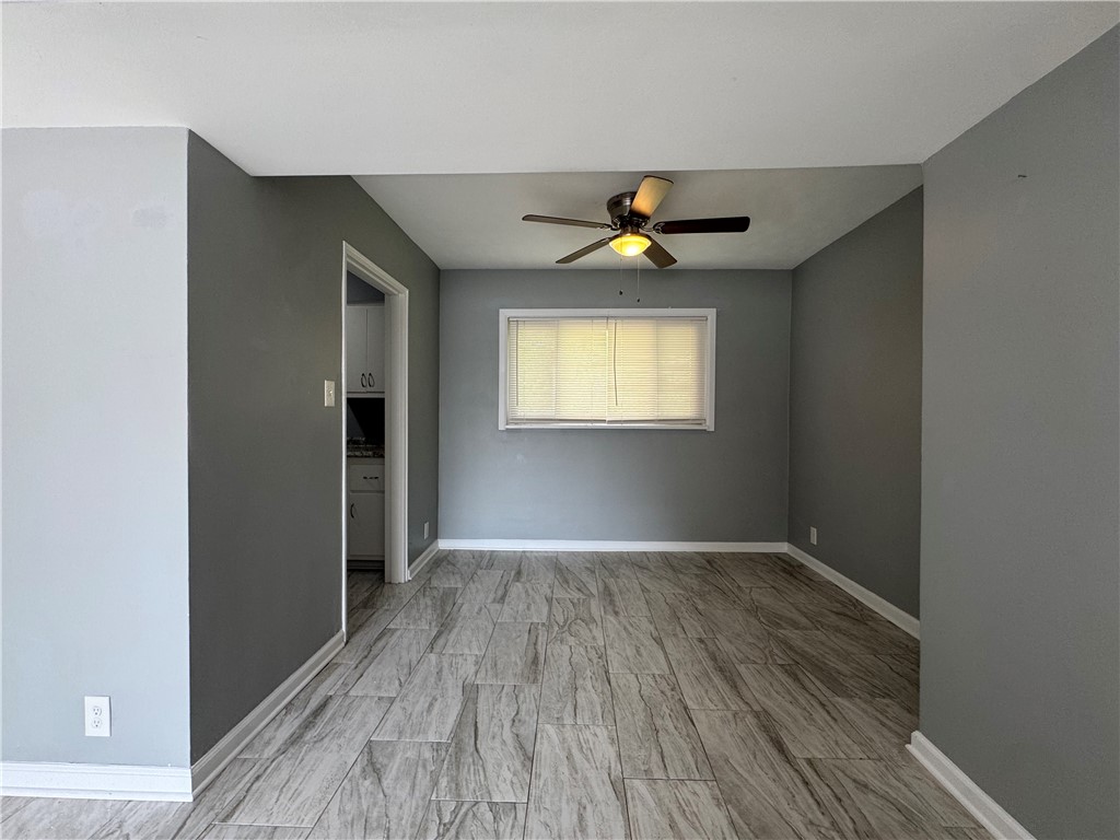 2358 South Patterson Boulevard, Unit 6 Kettering, OH 45409 - Photo 4 of 9 This versatile room features durable flooring, an inviting ambiance, and abundant natural light.