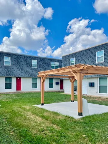 a front view of house with yard