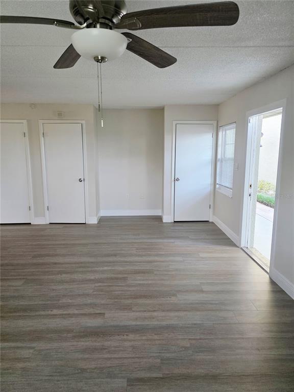 525 South Conway Road, Unit 53 Orlando, FL 32807 - Photo 11 of 12 a view of room with hardwood floor