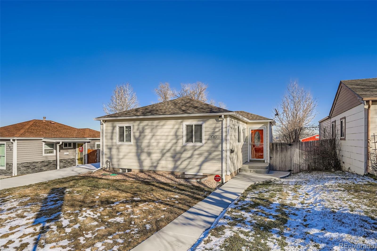 680 Irving Street Denver, CO 80204 - Photo 2 of 33 a front view of a house with garden