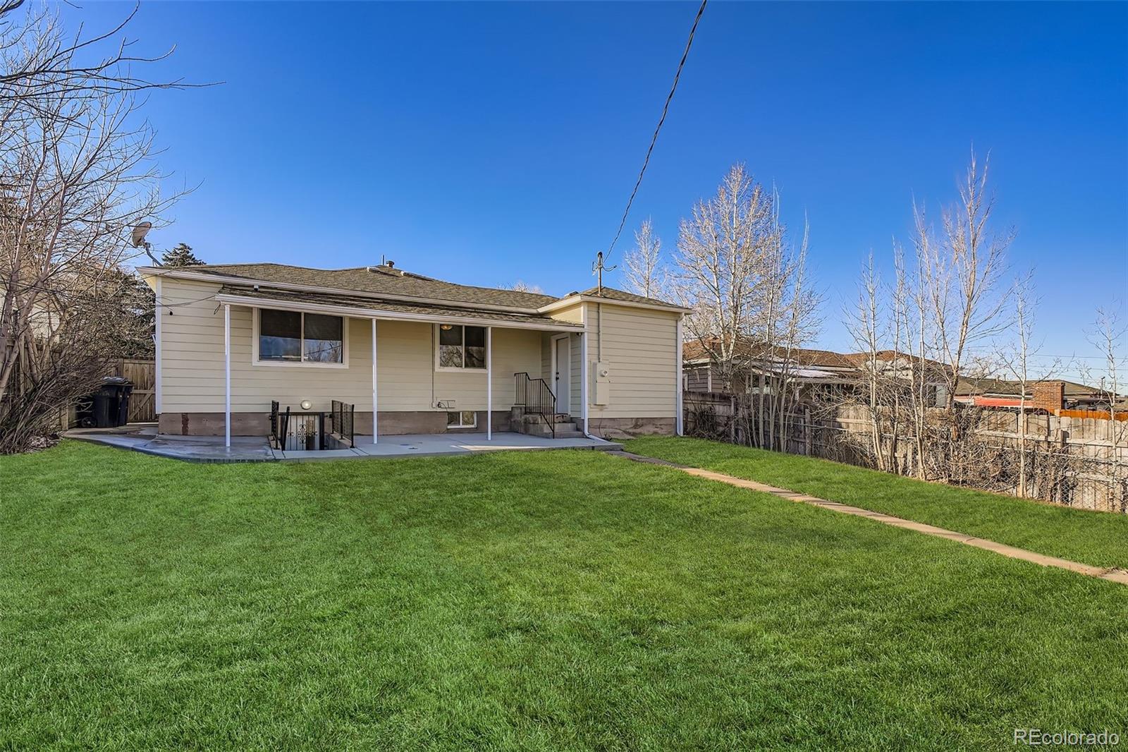 680 Irving Street Denver, CO 80204 - Photo 30 of 33 a view of a house with a backyard