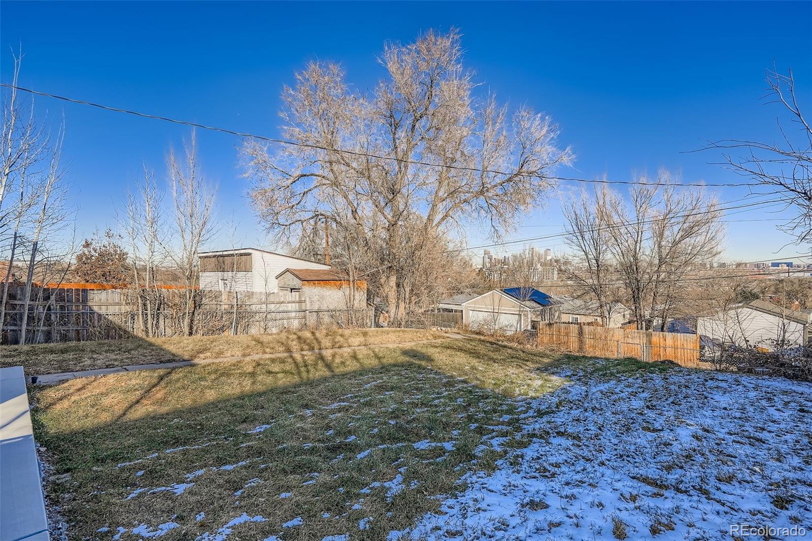 680 Irving Street Denver, CO 80204 - Photo 32 of 33 a view of a yard covered with snow