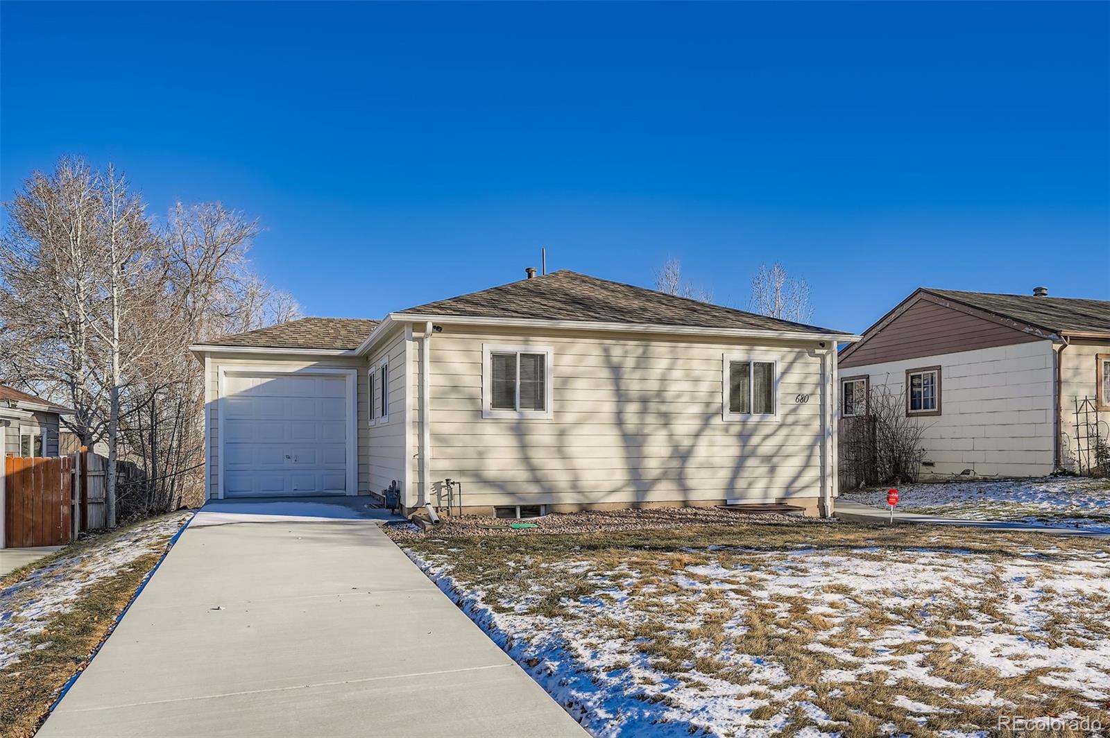 680 Irving Street Denver, CO 80204 - Photo 4 of 33 a view of a house with a yard