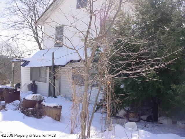 2295 Booth Road Hallstead, PA 18822 - Photo 3 of 6 a backyard of a house with lots of green space and outdoor seating