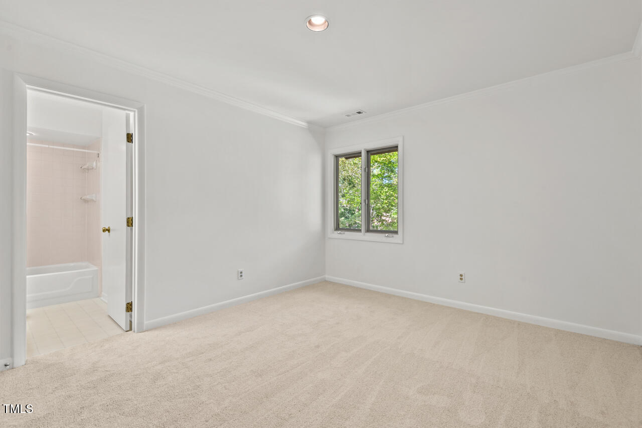 50 Stoneridge Road Durham, NC 27705 - Photo 33 of 40 an empty room with a window