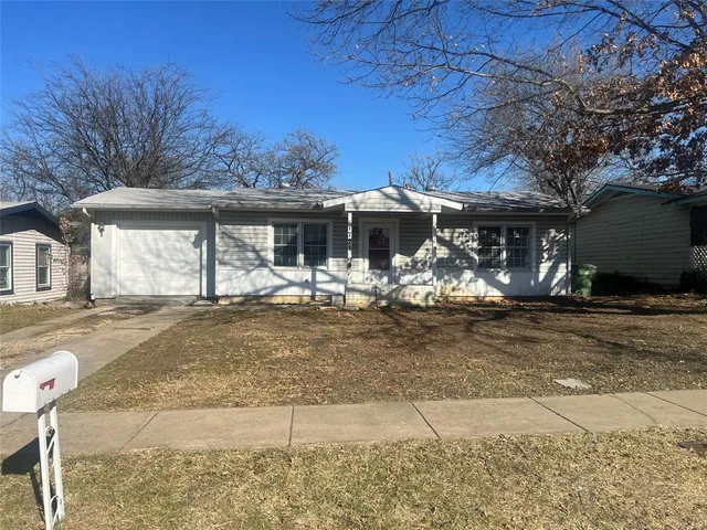 a view of a table and chairs in patio