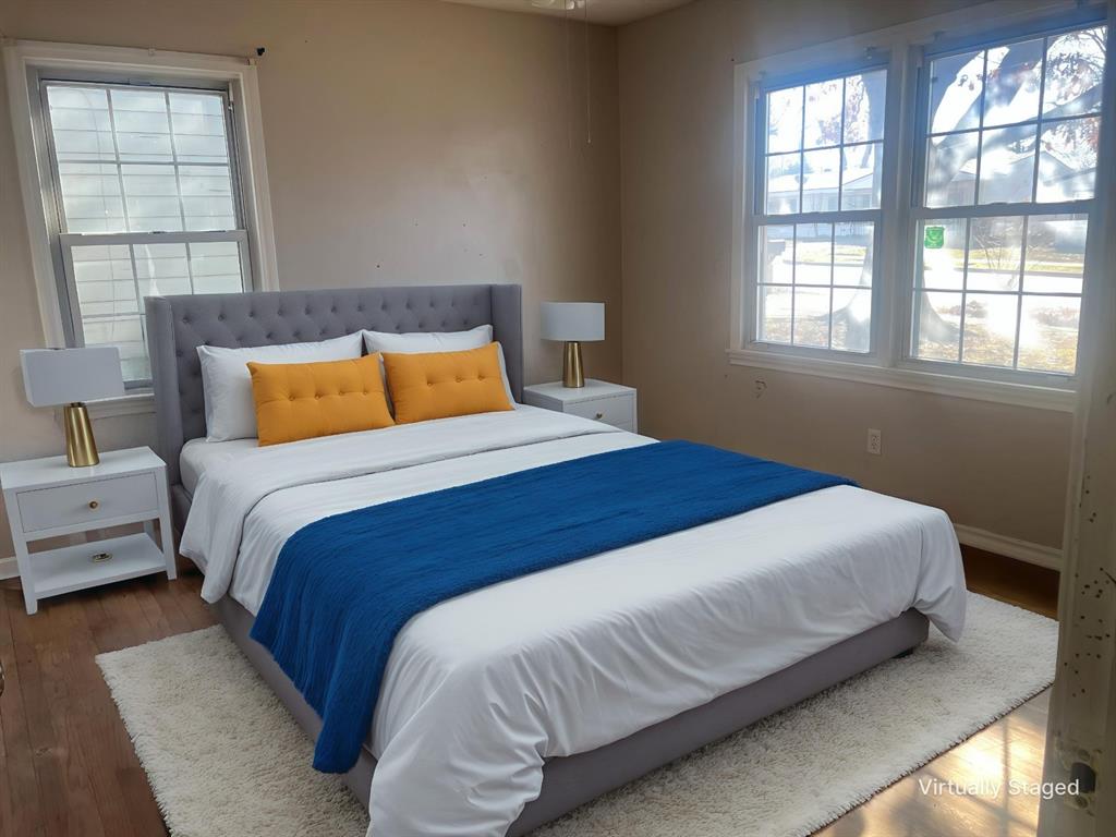 1721 Jocyle Street Arlington, TX 76010 - Photo 19 of 30 a bedroom with a bed and window