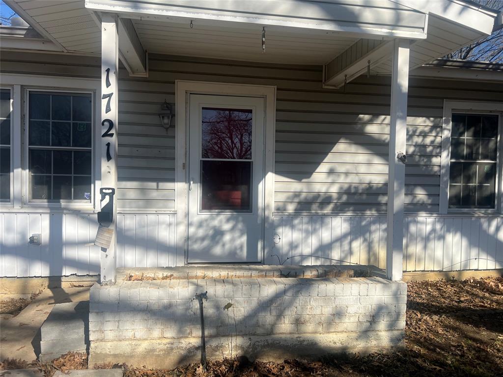 1721 Jocyle Street Arlington, TX 76010 - Photo 2 of 30 a view of parking area