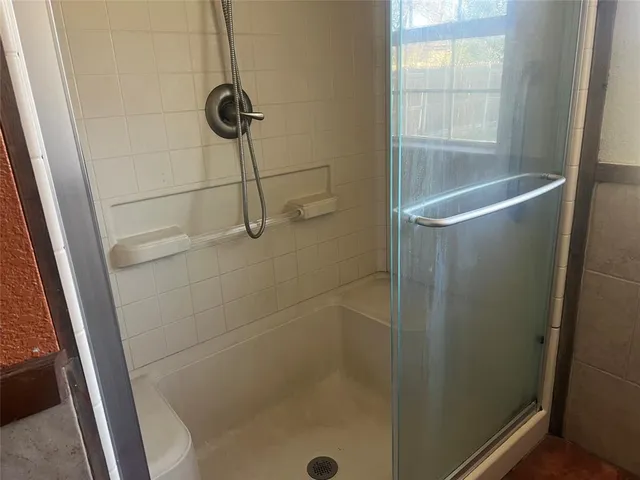 a kitchen with a sink and washing machine